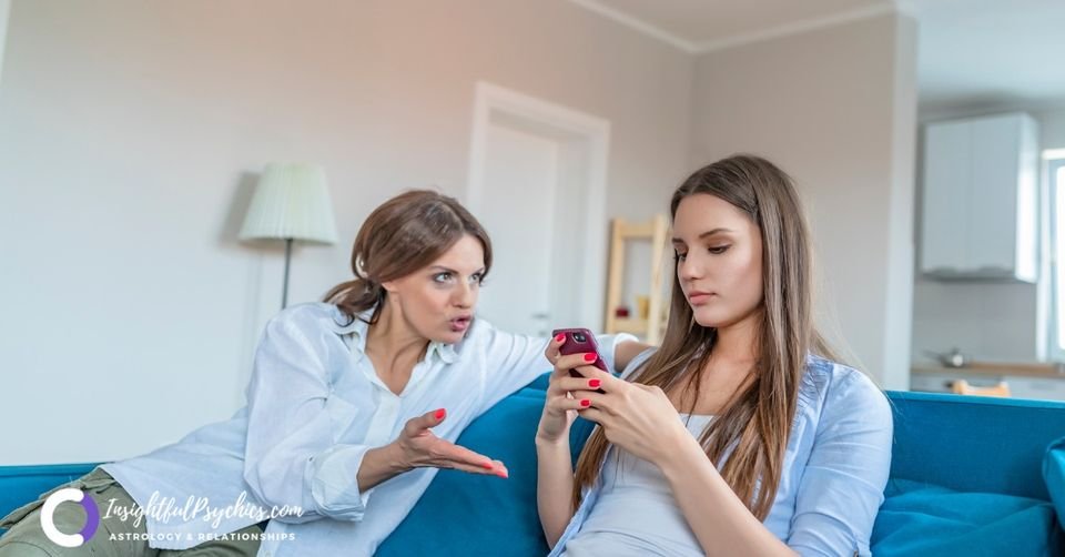 a woman looking at her phone not believing she ot ghostd - Zodiac Signs and Being Ghosted